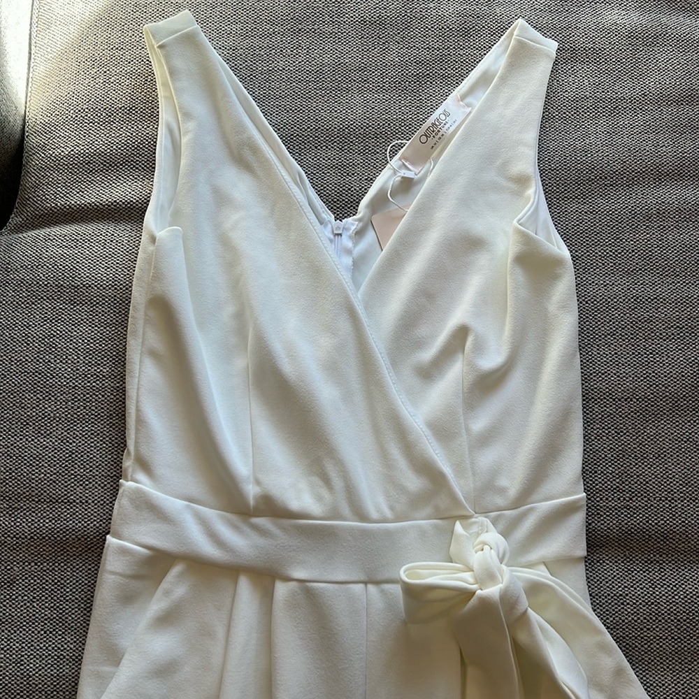 NWT WHITE SLEEVELESS JUMPSUIT